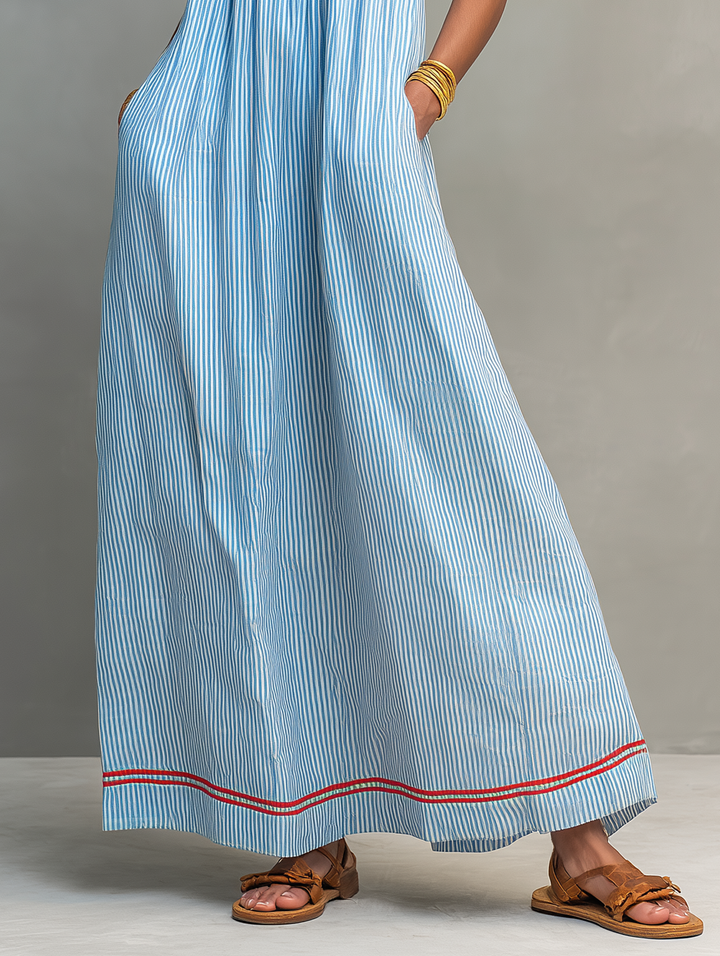 Lightweight women's sleeveless striped maxi dress with an elegant gathered waist, perfect for warm weather.