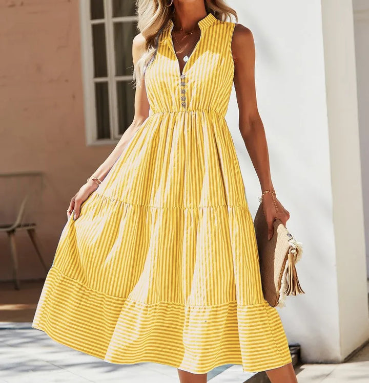 Casual women's striped midi dress, sleeveless & comfortable for warm summer days or beach wear.