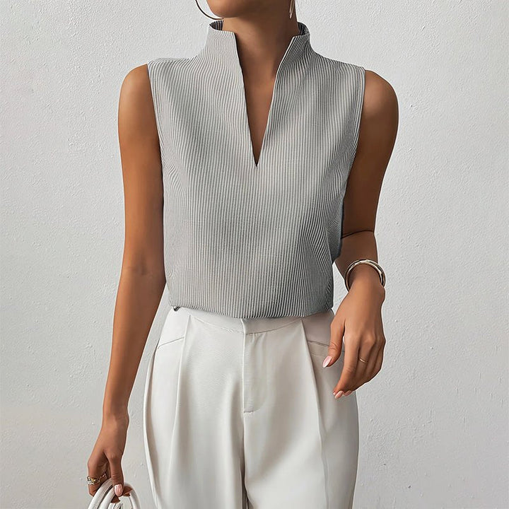 Women's striped sleeveless V-neck blouse with stand collar, ideal for office wear.