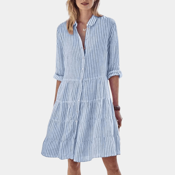Flowy striped tiered shirt dress for women, ideal as a casual summer or holiday outfit.
