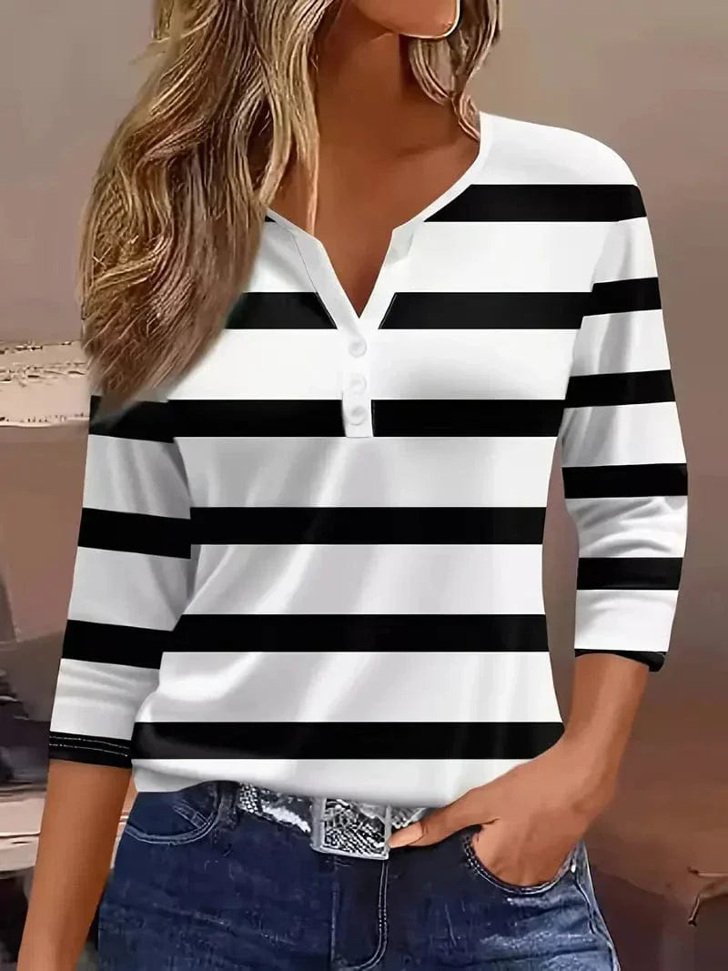 Stylish women's long sleeve V-neck top featuring a classic stripe pattern & unique petal sleeves for spring/summer.