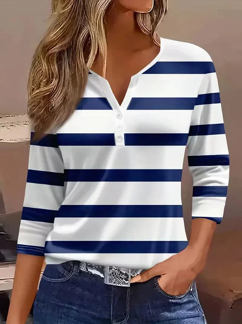 Casual women's striped V-neck top with long petal sleeves, a versatile piece for spring fashion & everyday wear.