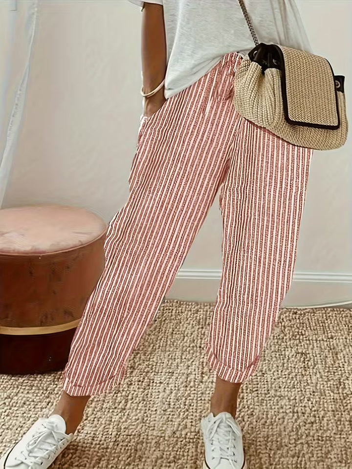 Relaxed fit wide-leg striped trousers for women, perfect for versatile casual wear and summer comfort.