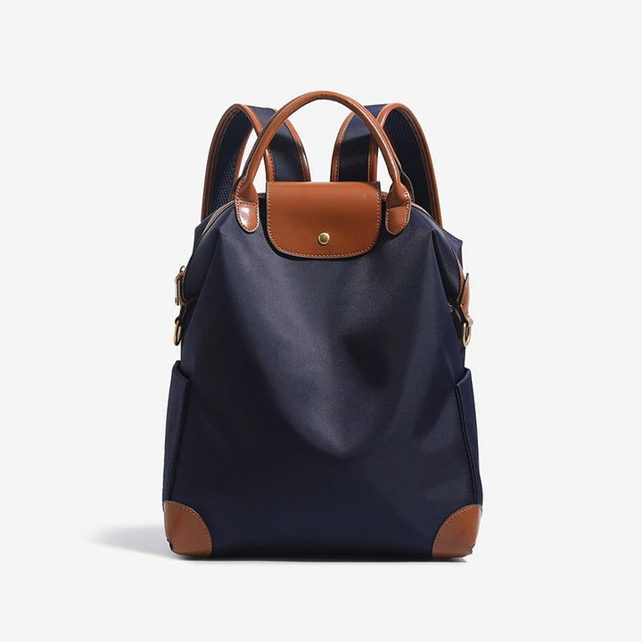 Cream women's structured backpack, spacious and stylish, ideal everyday travel bag with leather accents.