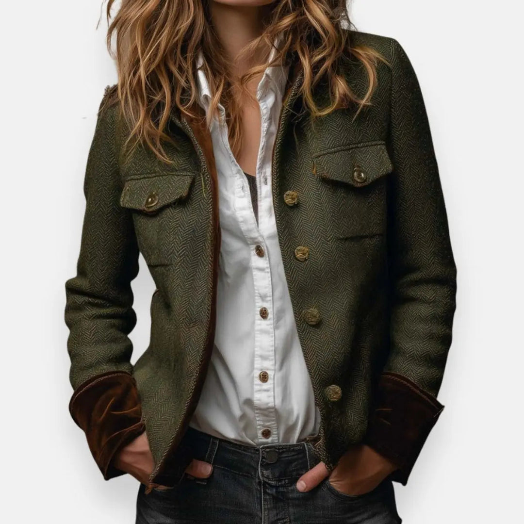 Women's structured quilted utility jacket with prominent gold button accents, perfect for smart casual style.