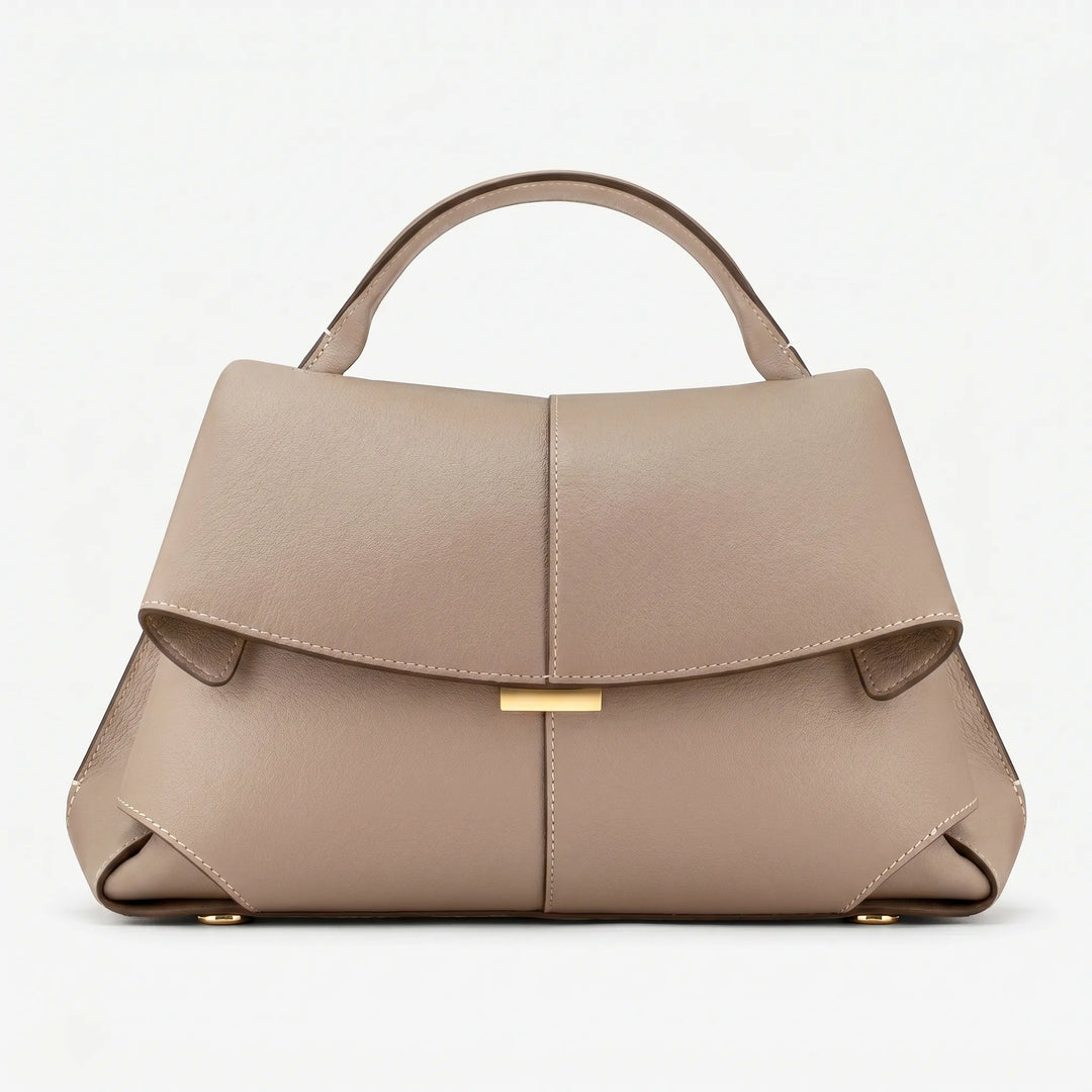 Chic women's structured top handle bag, a versatile purse for office elegance & fashion statement.
