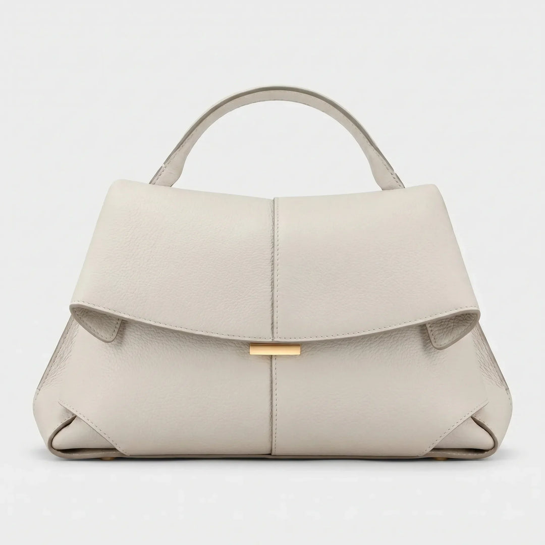 Modern structured handbag with sturdy top handle, a minimalist and sophisticated women's purse.