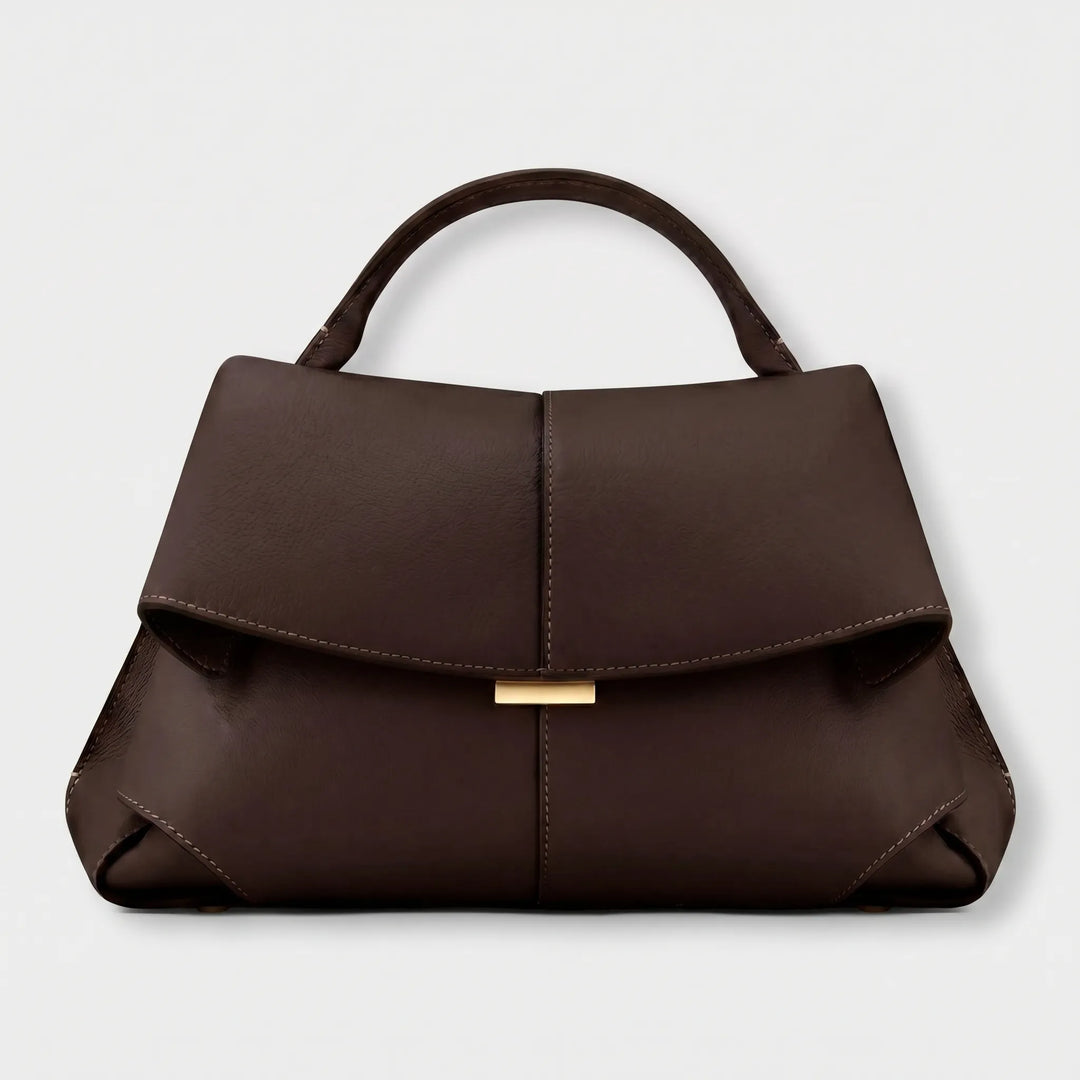 Stylish women's structured top handle bag, an elegant fashion accessory perfect for any polished outfit.