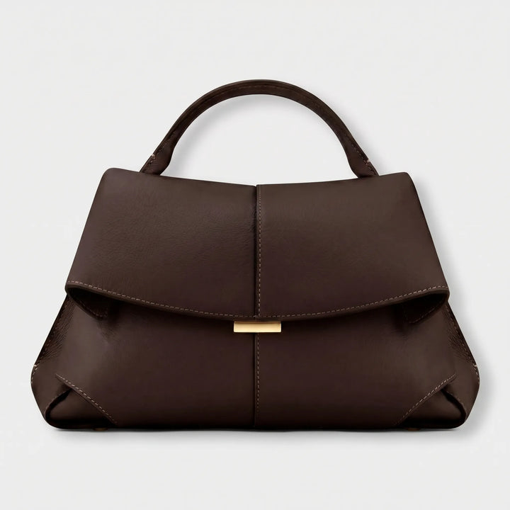 Stylish women's structured top handle bag, an elegant fashion accessory perfect for any polished outfit.