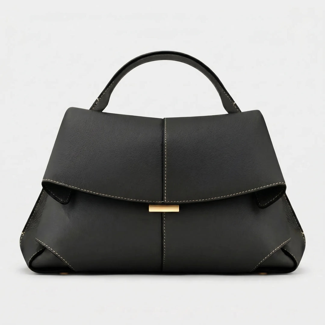 Sophisticated ladies structured top handle purse, a fashion statement accessory for elegant daily carry.