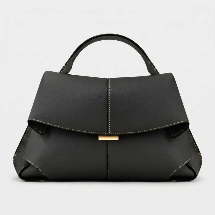 Sophisticated ladies structured top handle purse, a fashion statement accessory for elegant daily carry.