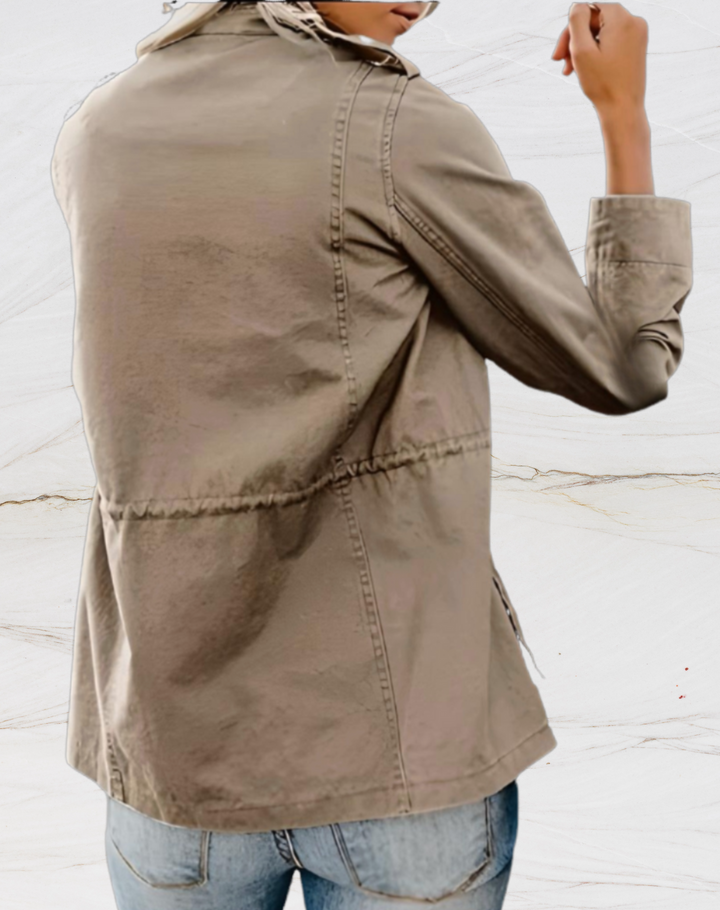 Lightweight women's utility jacket, structured and versatile for layering, featuring trendy pocket details for casual everyday wear.