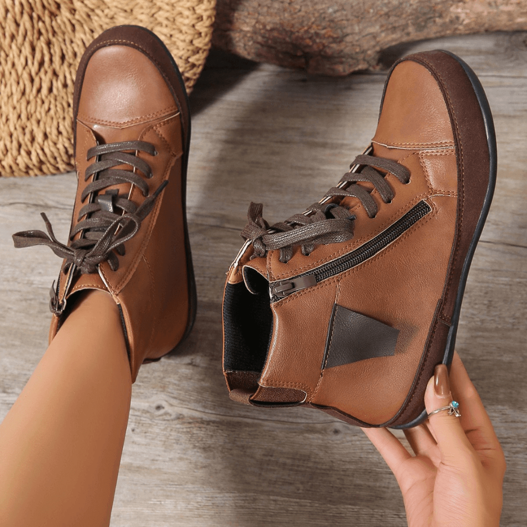 Comfortable women's ankle boots with a practical side zipper. Round toe design, great for fall & winter fashion.
