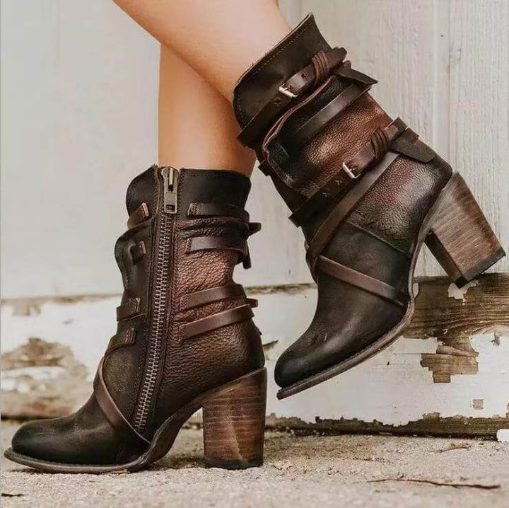 Fashionable women's ankle boots featuring adjustable buckle straps, a stable block heel, ideal for comfort and style.
