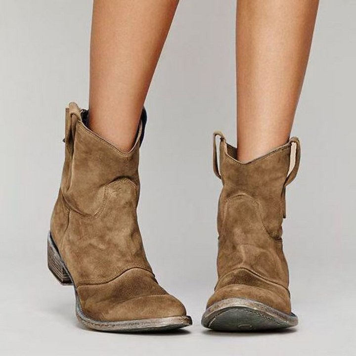 Comfortable women's fashion ankle boots. Western style with pull tabs, perfect for everyday casual footwear.