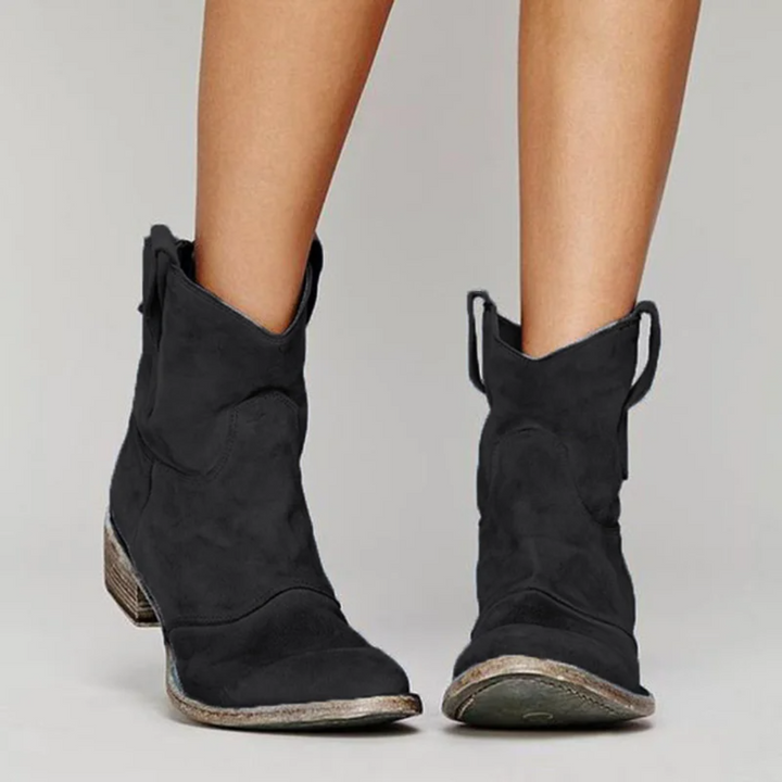 Chic women's western ankle boots. Practical pull tabs & comfortable low heel for stylish daily wear.