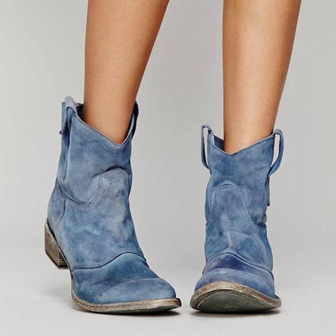 Versatile women's ankle western boots for casual outfits. Stylish pull tab design & comfortable low heel.