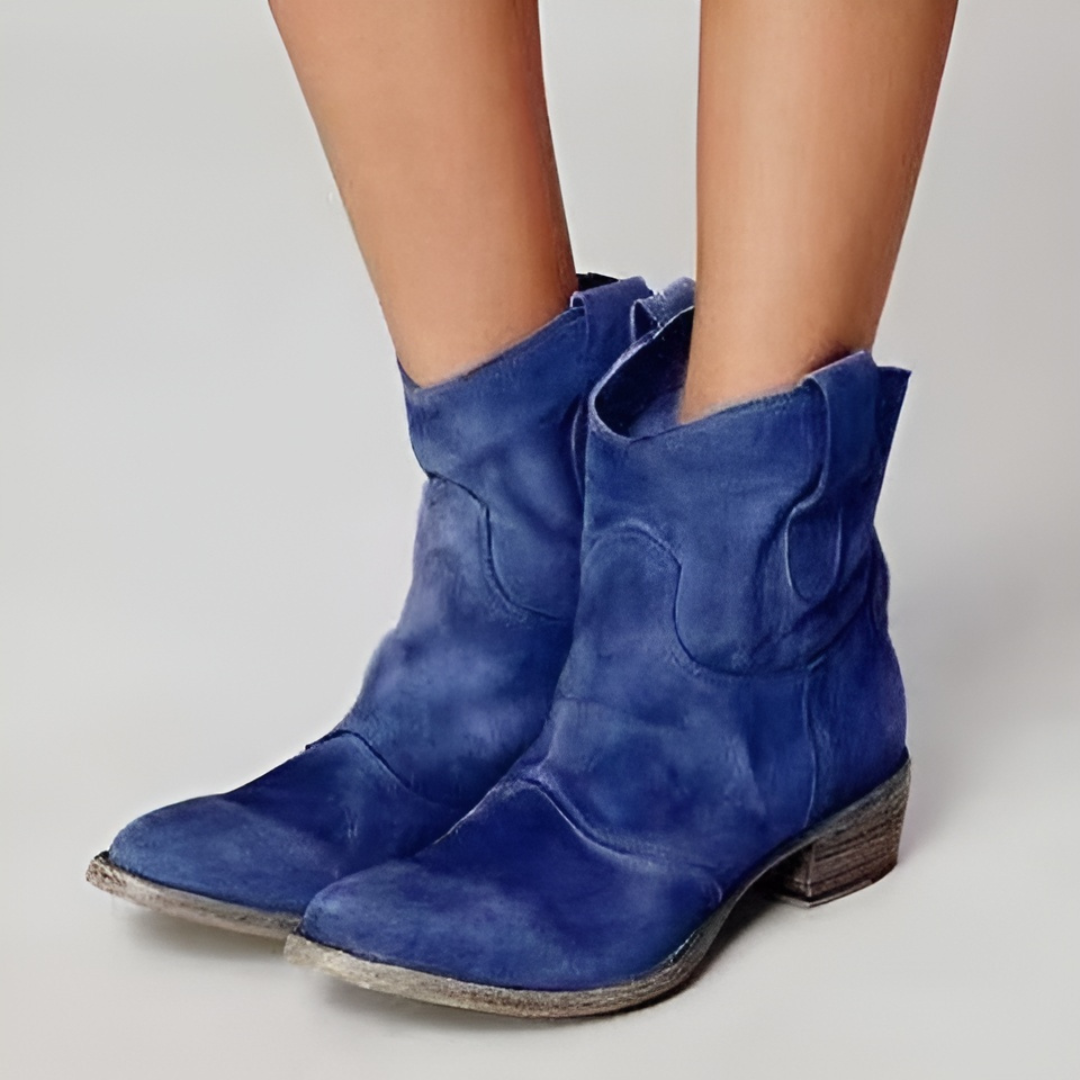 Classic women's western ankle boots with pull tabs. Comfortable low heel fashion footwear for everyday style.