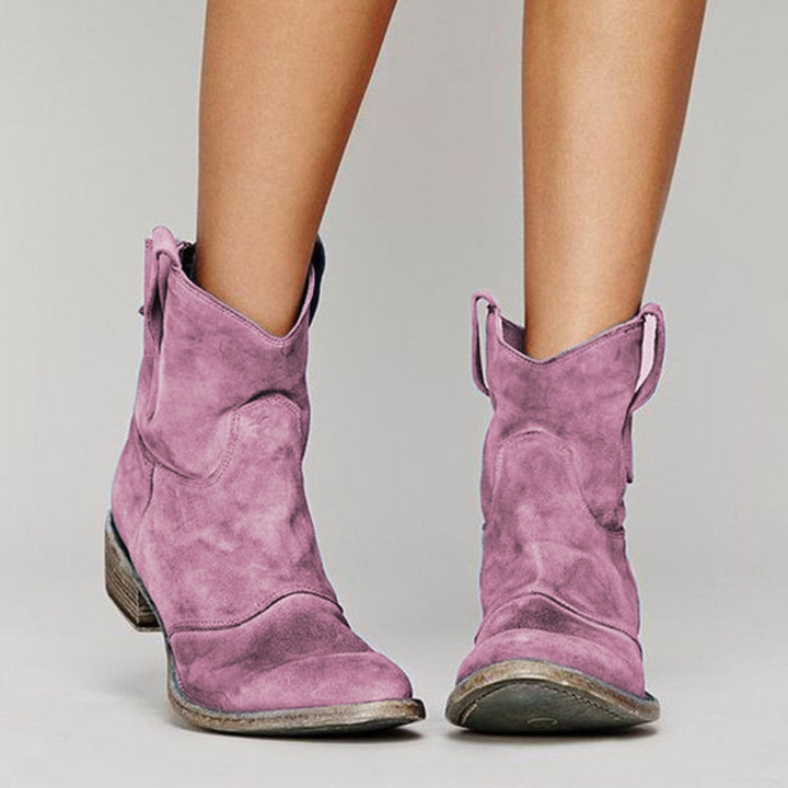 Easy-on women's ankle western boots featuring pull tabs. Designed for comfort & stylish everyday wear.