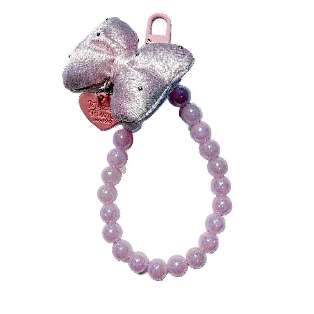 Fashionable women's beaded keychain with elegant bow design, an ideal stylish gift accessory.