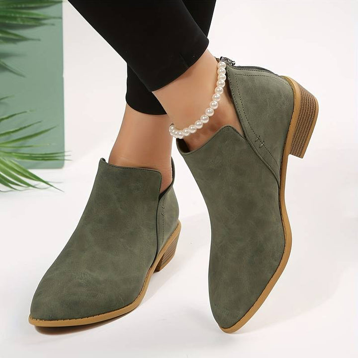 Chic women's ankle boots for autumn & winter, featuring a pointed toe and comfortable low heel for stylish everyday wear.