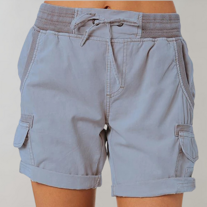 Back view of women's relaxed-fit cargo shorts, featuring practical pockets and a comfortable, stylish design for any adventure.