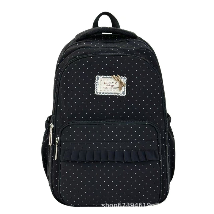 Adorable women's ruffled polka dot backpack, a stylish and practical choice for school and travel.