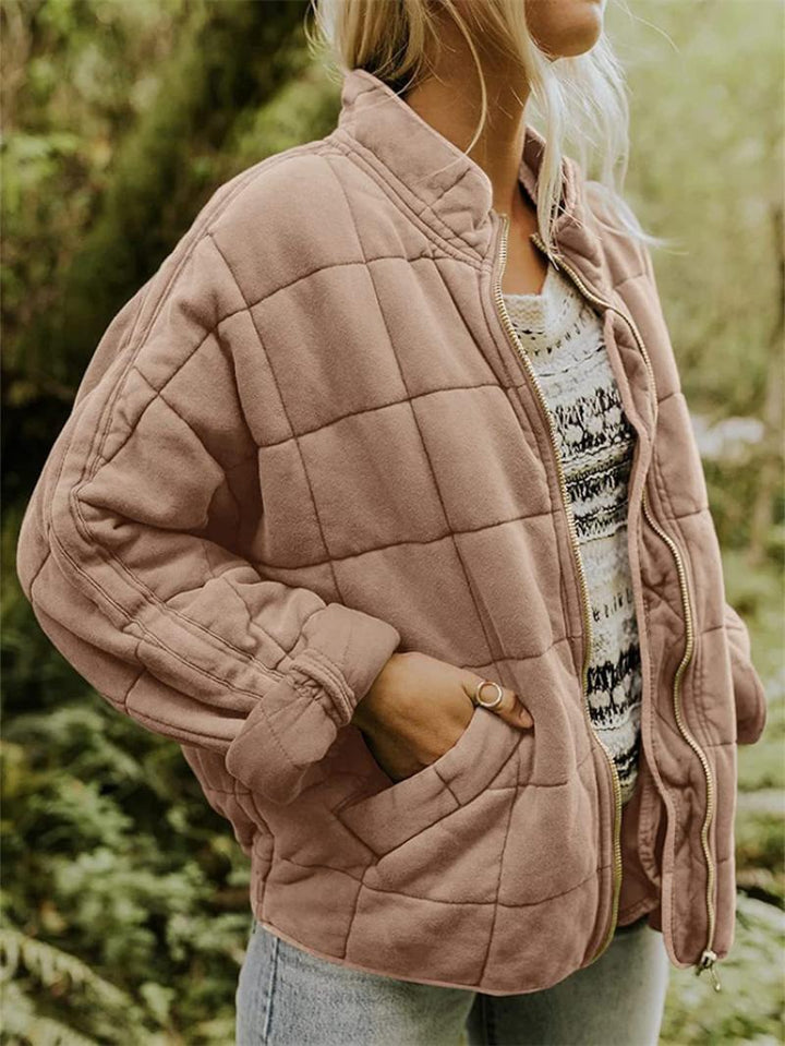 Versatile women's quilted jacket with zipper closure, perfect lightweight layer for everyday chic style.