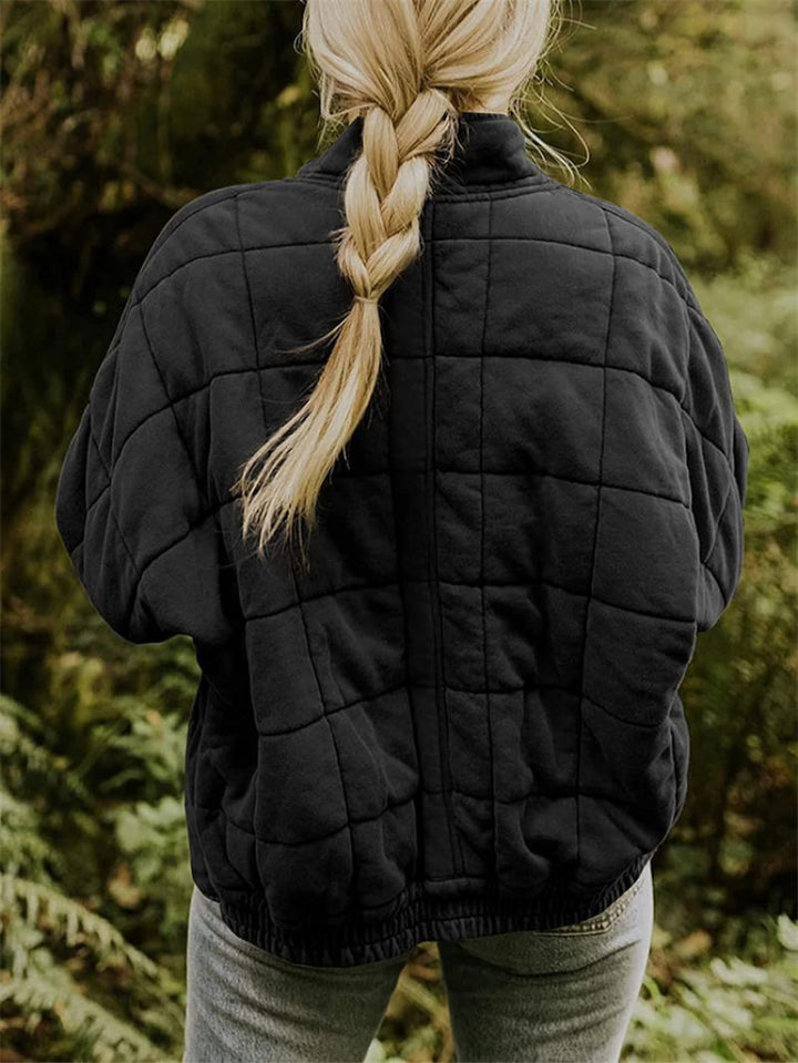 Everyday women's quilted jacket with a convenient zipper, combining style and warmth for versatile wear.