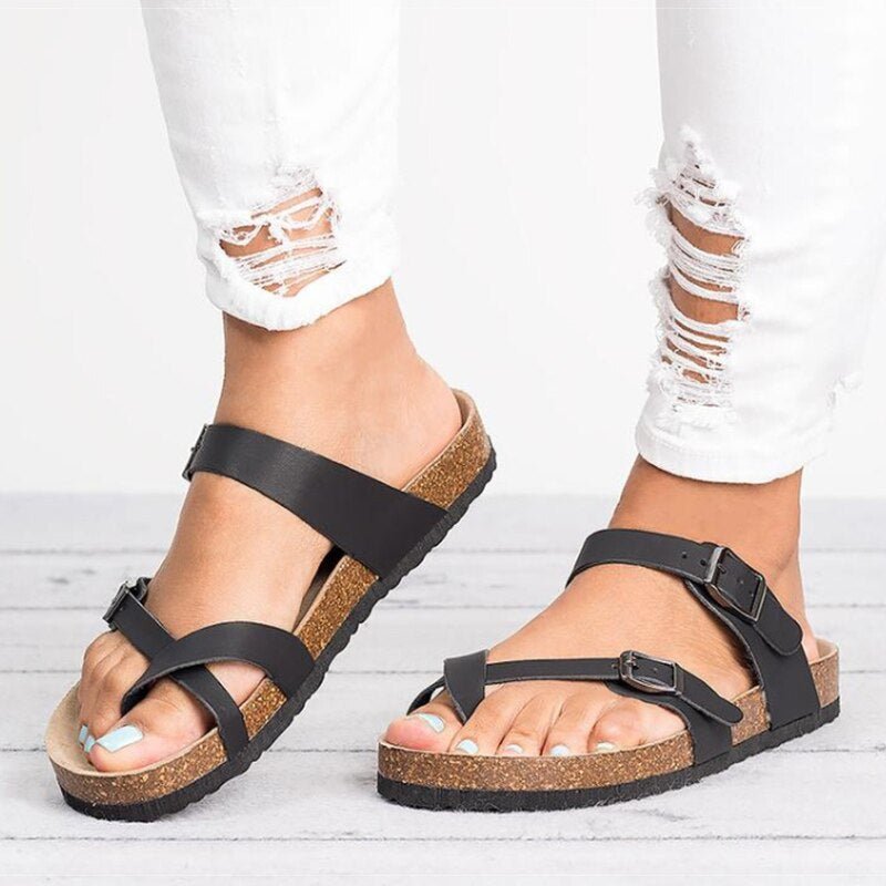 Women's stylish buckle toe-post flat sandals with cork footbed for supportive summer comfort & everyday wear.