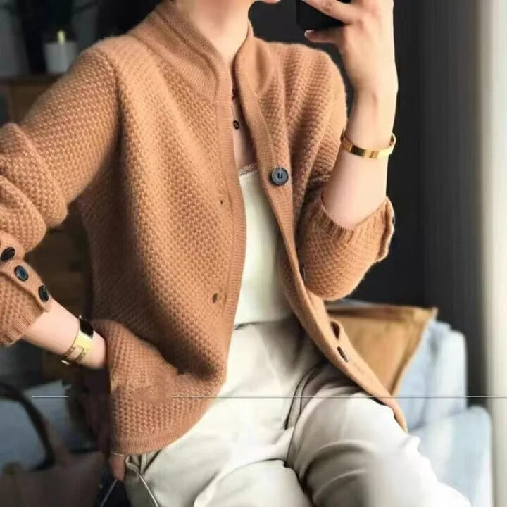 Transitional women's button-up cardigan jacket. Chic outerwear with a relaxed fit & modern style, perfect for everyday fashion.