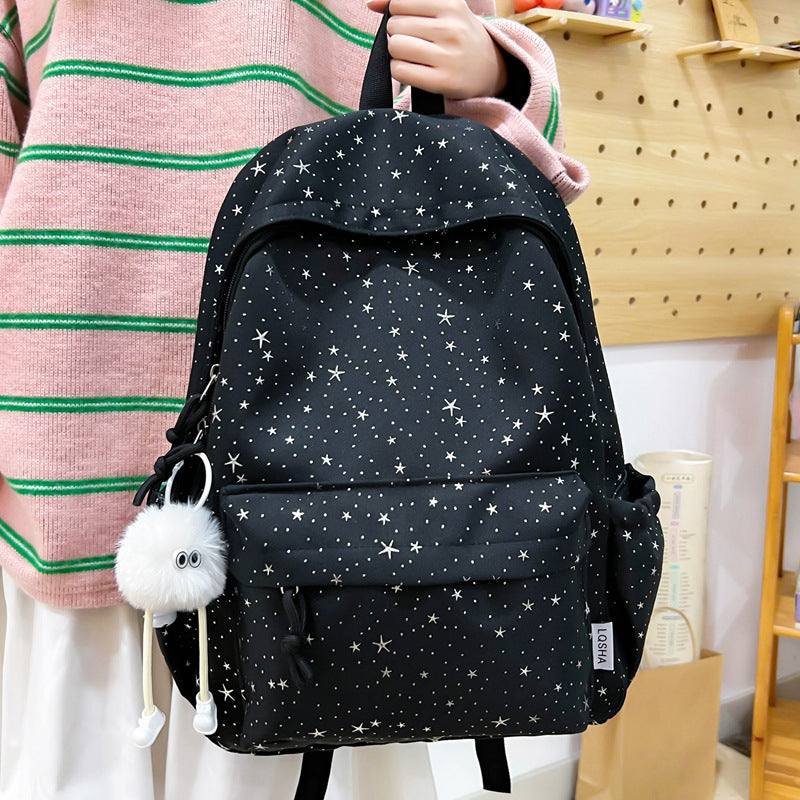 Lightweight women's backpack featuring unique star details, ideal for school, travel, or daily commute.