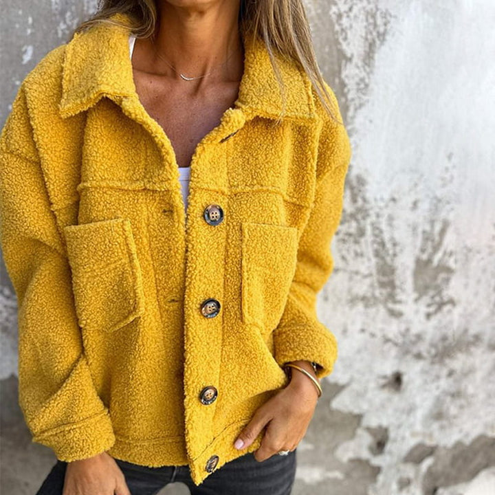 Black women's stylish jacket, ideal for everyday wear, offering a relaxed fit and casual fashion.