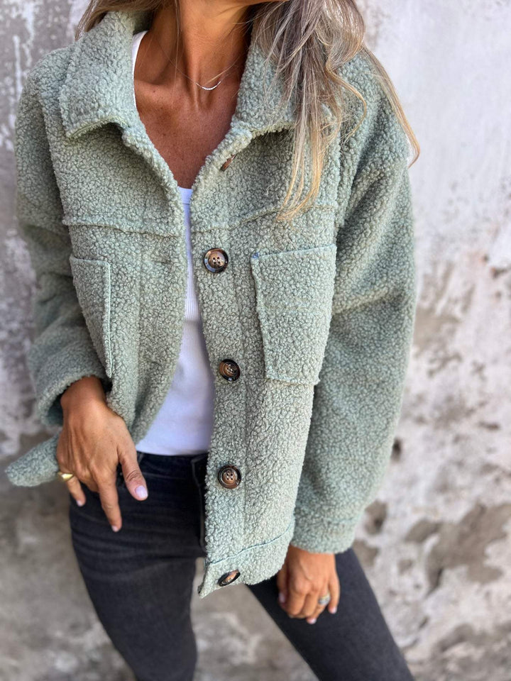 Green women's cosy jacket with a comfortable fit, perfect for stylish casual fashion and everyday wear.