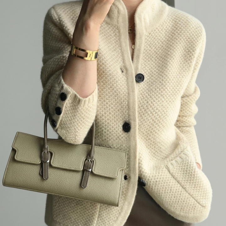 Cozy women's cable knit cardigan for layering. Stylish long-sleeve, button-front for versatile casual everyday wear.