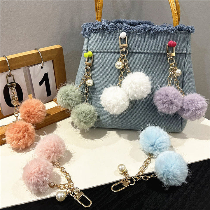Women's stylish denim tote bag with chic frayed edges, perfect for casual everyday use.