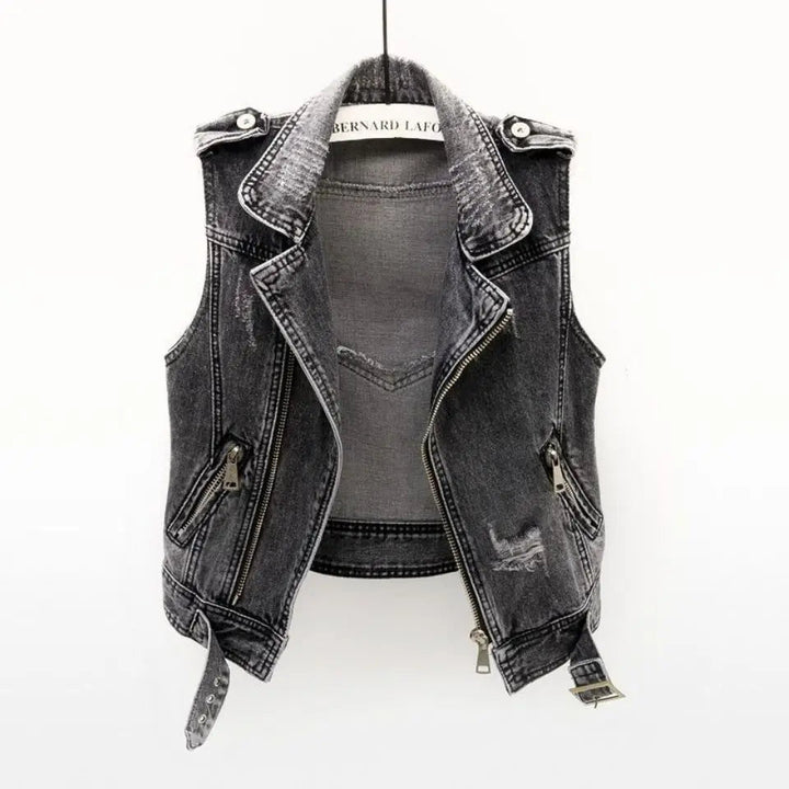 Sleeveless distressed denim vest for women, ideal stylish outerwear for a casual, trendy outfit.