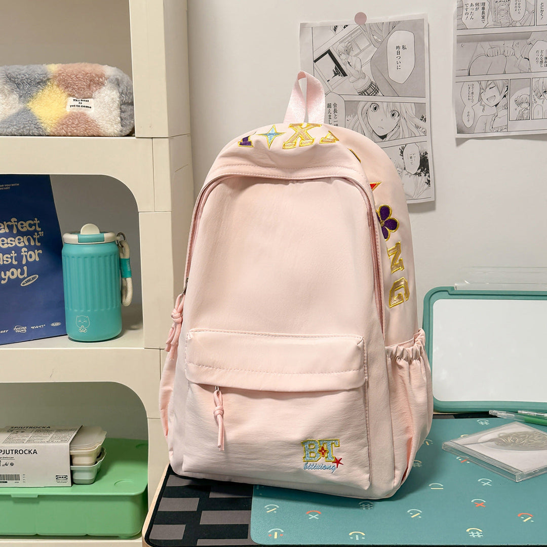 Vibrant women's embroidered fashion backpack, a durable and stylish bag for daily use, travel, or school.