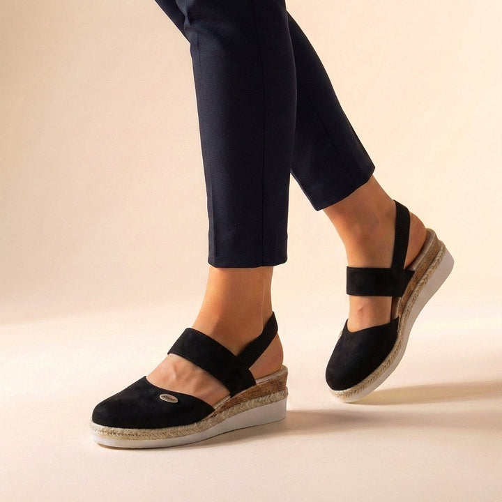 Slip-on women's espadrille platform sandals, ideal for vacation comfort, style, and ergonomic support.