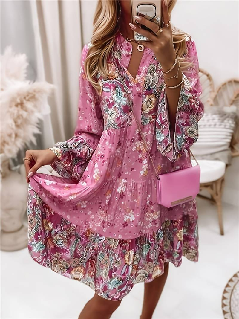 Women's stylish floral boho mini dress with a charming print, perfect for summer fashion.