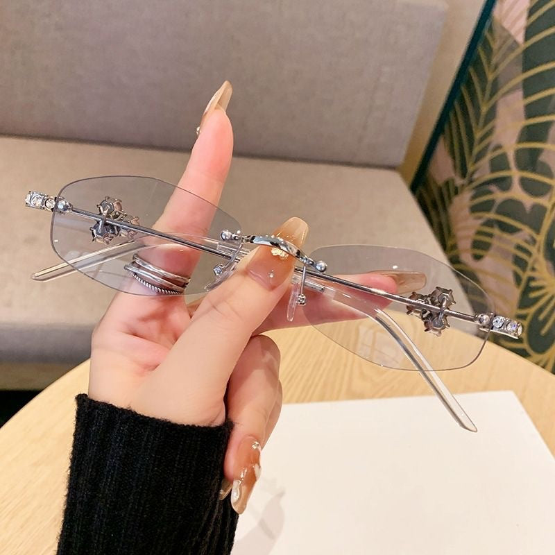 Women's stylish geometric sunglasses with luxurious golden accents, offering UV protection.
