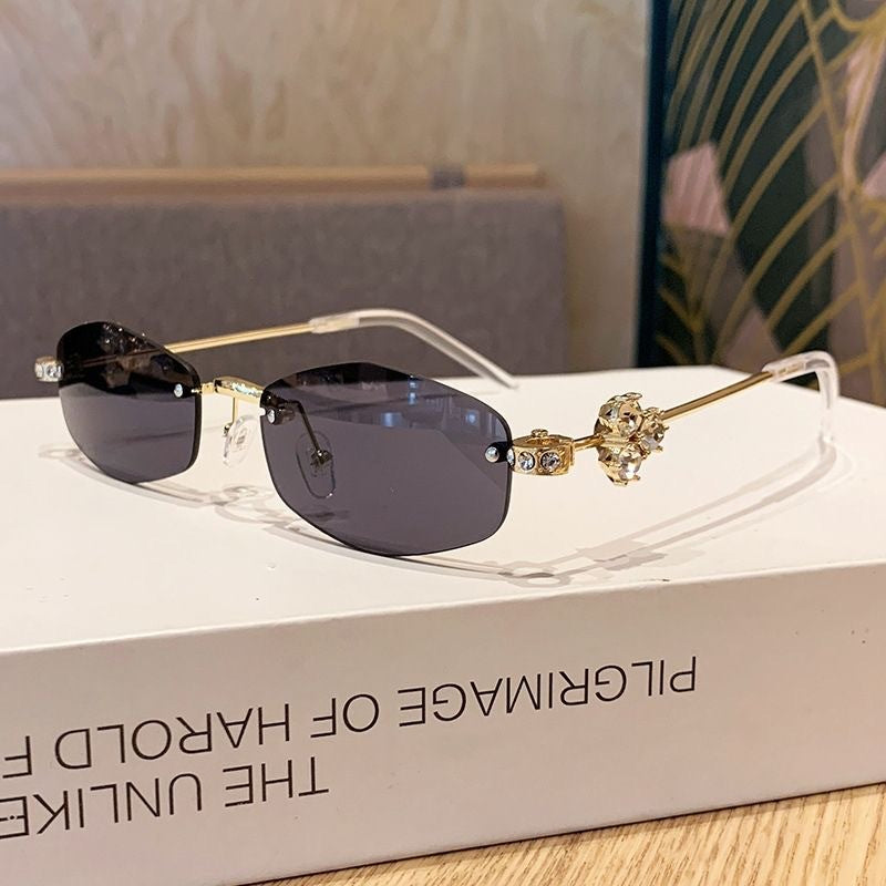 Fashion-forward women's sunglasses, gold-accented, providing essential UV eye protection.