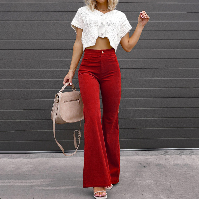 Versatile black high-waist flared pants for women. Stylish and comfortable wide-leg trousers, perfect for elegant fashion.
