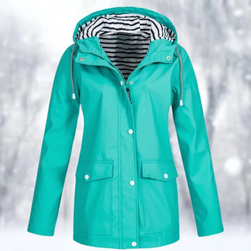 Chic women's hooded raincoat, fully waterproof. Perfect lightweight outerwear for travel & spring.