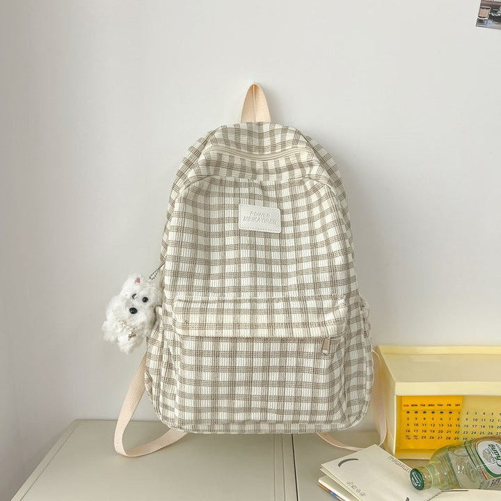 Stylish checkered school backpack for women, featuring a trendy plaid pattern in khaki tones. Ideal for students.