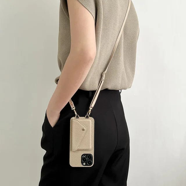 Durable leather crossbody phone case accessory for women, featuring a built-in card holder and key cord.