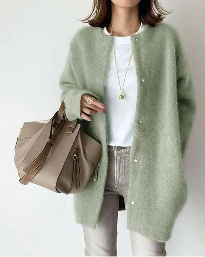 Cozy women's long sleeve lightweight sweater, versatile for everyday wear. A comfortable and stylish top.