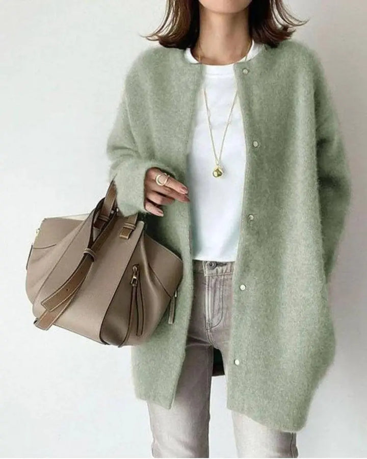 Cozy women's long sleeve lightweight sweater, versatile for everyday wear. A comfortable and stylish top.