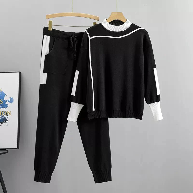 Versatile women's two-piece tracksuit. Long sleeve top & athletic joggers for active or casual fashion.