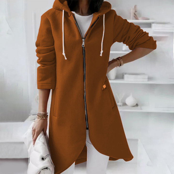 Elegant women's outerwear: a longline hooded jacket, blending style and comfort for any season.
